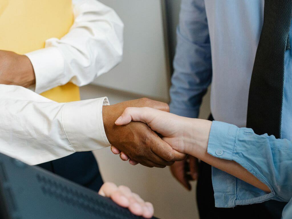 Close-up of a handshake between two business professionals